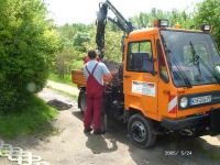 Multicar mit Kran-Wegeausbesserung